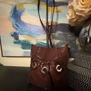 Vintage B. Makowsky brown leather crossbody bucket bag.